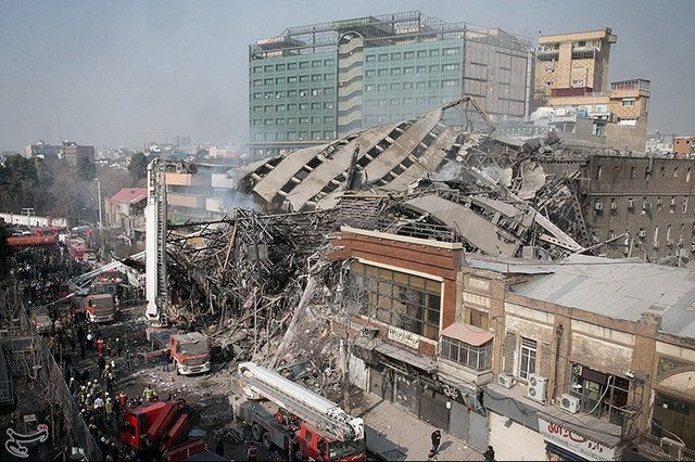 A collapsed building is seen in Tehran, Iran January 19, 2017. Tasnim News Agency/Handout via REUTERS   ATTENTION EDITORS - THIS PICTURE WAS PROVIDED BY A THIRD PARTY. FOR EDITORIAL USE ONLY. NO RESALES. NO ARCHIVE. THIS PICTURE WAS PROCESSED BY REUTERS TO ENHANCE QUALITY. AN UNPROCESSED VERSION HAS BEEN PROVIDED SEPARATELY.     TPX IMAGES OF THE DAY