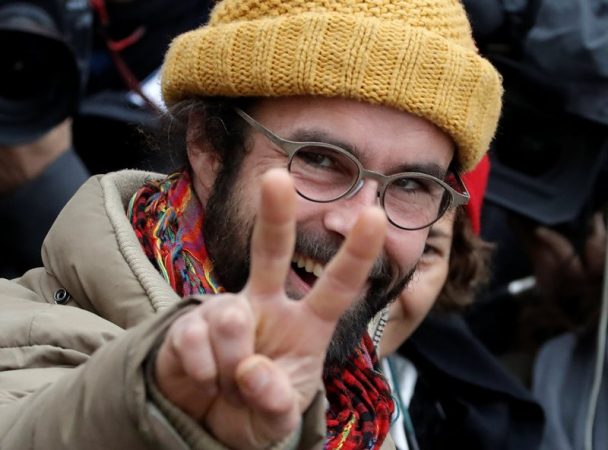 Cedric Herrou, a French farmer and volunteer helping migrants cross French-Italian border to avoid police controls, reacts after he was handed a 3,000 euros ($3,192) suspended fine for his actions at the courthouse in Nice, France, February 10, 2017.   REUTERS/Eric Gaillard     TPX IMAGES OF THE DAY