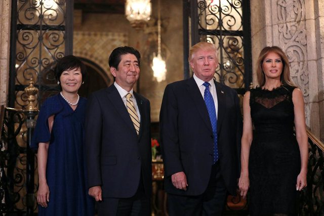 U.S. President Donald Trump, First Lady Melania Trump (R), Japanese Prime Minister Shinzo Abe and his wife Akie Abe (L) pose for a photograph before attending dinner at Mar-a-Lago Club in Palm Beach, Florida, U.S., February 11, 2017. REUTERS/Carlos Barria