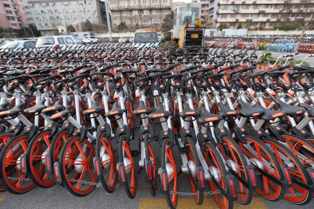 Confiscated sharing bicycles of different brands are seen at a parking lot of Huangpu District Vehicle Management Company in Shanghai, China, February 28, 2017. Picture taken February 28, 2017. REUTERS/Stringer ATTENTION EDITORS - THIS IMAGE WAS PROVIDED BY A THIRD PARTY. EDITORIAL USE ONLY. CHINA OUT. NO COMMERCIAL OR EDITORIAL SALES IN CHINA.