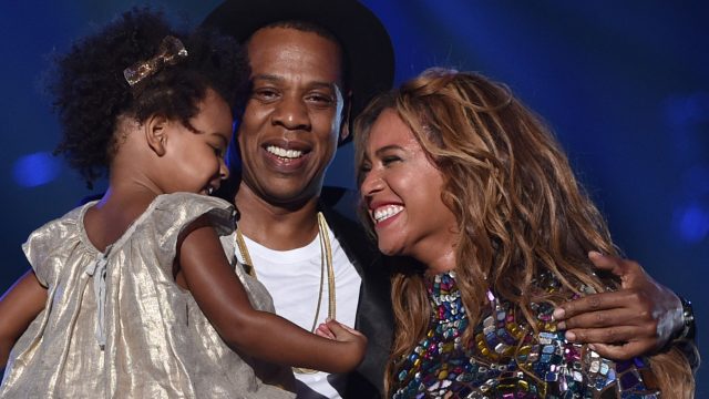 INGLEWOOD, CA - AUGUST 24: (L-R) Blue Ivy Carter, recording artists Jay Z and Beyonce speak onstage during the 2014 MTV Video Music Awards at The Forum on August 24, 2014 in Inglewood, California. (Photo by MTV/MTV1415/Getty Images for MTV)