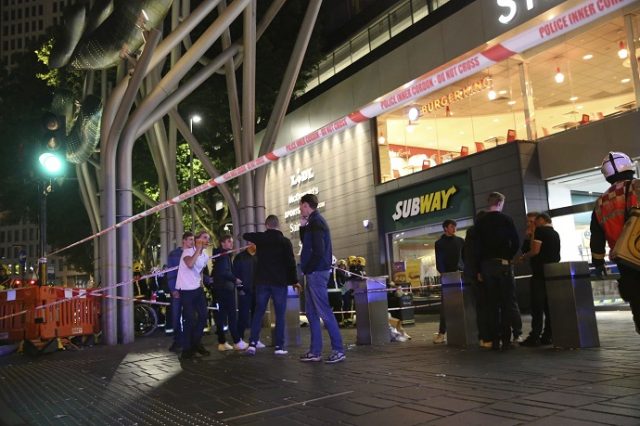 Emergency services at Stratford Centre in east London, following a suspected noxious substance attack where six people have been reported injured, Saturday Sept. 23, 2017. One man has been arrested on suspicion of causing grievous bodily harm. (PA via AP)