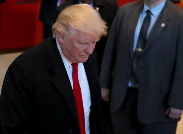 epa05642708 US President-elect Donald Trump leaves the New York Times offices after a meeting in New York, New York, USA, on 22 November 2016.  EPA/ANDREW GOMBERT