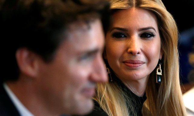Ivanka Trump looks toward Canadian Prime Minister Justin Trudeau (L) during U.S. President Donald Trump's roundtable discussion on the advancement of women entrepreneurs and business leaders at the White House in Washington, U.S. February 13, 2017. REUTERS/Kevin Lamarque