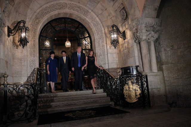 U.S. President Donald Trump, First Lady Melania Trump (R), Japanese Prime Minister Shinzo Abe and his wife Akie Abe (L) pose for a photograph before attending dinner at Mar-a-Lago Club in Palm Beach, Florida, U.S., February 11, 2017. REUTERS/Carlos Barria