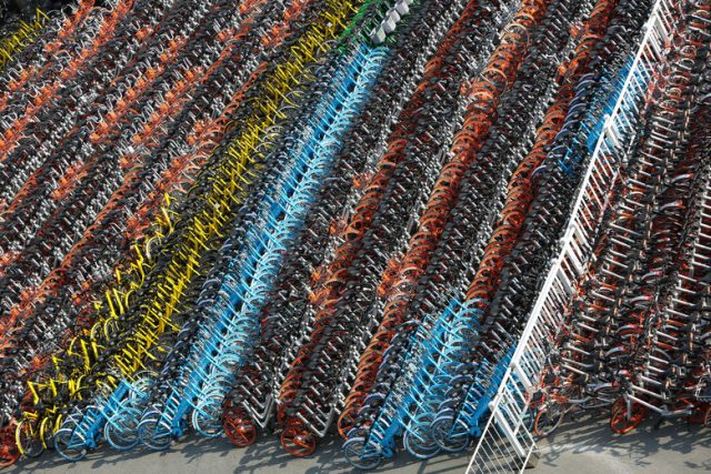 Confiscated sharing bicycles of different brands are seen at a parking lot of Huangpu District Vehicle Management Company in Shanghai, China, February 28, 2017. Picture taken February 28, 2017. REUTERS/Stringer ATTENTION EDITORS - THIS IMAGE WAS PROVIDED BY A THIRD PARTY. EDITORIAL USE ONLY. CHINA OUT. NO COMMERCIAL OR EDITORIAL SALES IN CHINA.