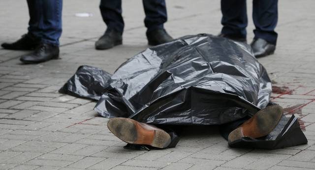 ATTENTION EDITORS - VISUAL COVERAGE OF SCENES OF INJURY OR DEATH The covered body of Denis Voronenkov, a former lawmaker of the Russian State Duma, Denis Voronenkov, who was shot dead, is seen in central Kiev, Ukraine March 23, 2017. REUTERS/Valentyn Ogirenko TEMPLATE OUT.