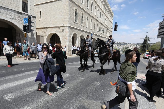Israeli policemen on horses keep the order following a stabbing attack just outside Jerusalem's Old City, according to Israeli police April 14, 2017. REUTERS/Ammar Awad