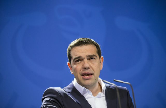 Greek Prime Minister Alexis Tsipras addresses a news conference following talks with German Chancellor Angela Merkel at the Chancellery in Berlin March 23, 2015. Tsipras, pressing for cash to keep his country afloat, began talks with Merkel on Monday after Berlin ruled out any breakthrough in differences with the euro zone over Athens's international bailout. REUTERS/Hannibal Hanschke - RTR4UJIR