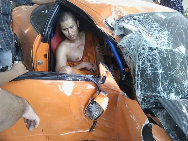 NEWS COPY - WITH PICTURES A demob-happy monk borrowed his friends sports car to celebrate and crashed it - into a TREE. Thapanat Chaiyasut, 31, was just one day from leaving the strict monkhood when he took a pals orange Nissan Silvia S15 for a spin yesterday (Tue). But after leaving the driveway he accelerated away before minutes later clipping a tree and spinning out of control in Suphanburi, central Thailand.  Thapanat - still wearing orange robes when he was found in the drivers seat - suffered a broken arm and cuts to his leg while passenger Boonyarit Puengchareon, 19, was unconscious. Police said that Thapanat and his passenger had both been taken to hospital where they were stable after the 'Fast and Furious' style crash. Police captain Mr. Kornvit Meedee from the Samshook district station said the monk had been speed testing the vehicle.  He said: Police arrived at the scene with ambulance staff from the Samshook hospital and we found the car crashed with Phra Thapanat inside.  The sports car had been modified. It hit a tree at the side of the road and crashed. The front window was smashed and a front wheel had blown out.'' Pol Cpt Meedee said officers and the ambulance team immediately took the injured men to the hospital. The driver was not arrested or charged with any offences.  He added: ''They investigated and found out that Pra Tapanatchaisut's friends drove the car to see him and Pra Tapanatchaisut borrowed the car to drive on the road to test how fast the car is. ''Pra Tapanatchaisut drove as fast as he can until he hit the tree very hard. Pra Tapanatchaisut was supposed to leave the temple the next day on 26th April but the accident happened just a day before.' A spokesman for the Smerkan Supanburi foundation said the believed the car was a Nissan Silvia S15 and its bodywork been modified.  They added: It was too fast for the monk to handle. The car is like the same one from the Fast and Furious movies.'' ENDS