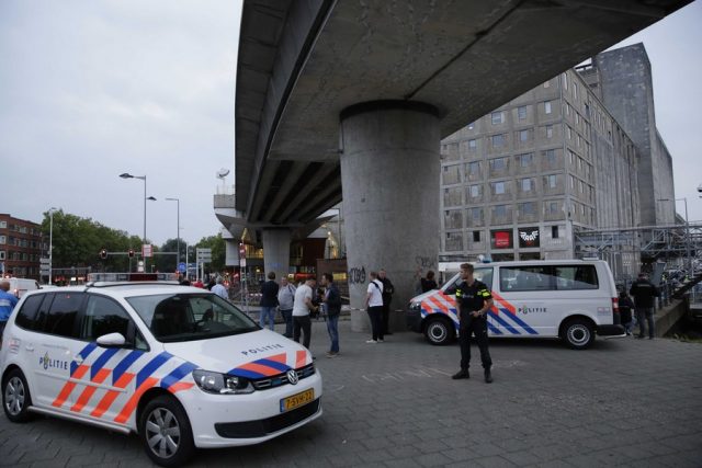 epa06158868 Police evacuate the concert venue Maassilo, due to a terrorist threat, in Rotterdam, the Netherlands, 23 August 2017. A van with Spanish number plate packed with gas canisters was located in the vicinity of the concert venue Maassilo where a concert of the US band 'Allah-Las' was scheduled to take place.  EPA/ARIE KIEVIT