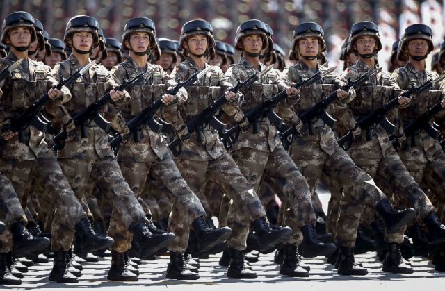 Chinese troops march during the military parade marking the 70th anniversary of the end of World War Two, in Beijing, China, September 3, 2015. REUTERS/Rolex Dela Pena/Pool